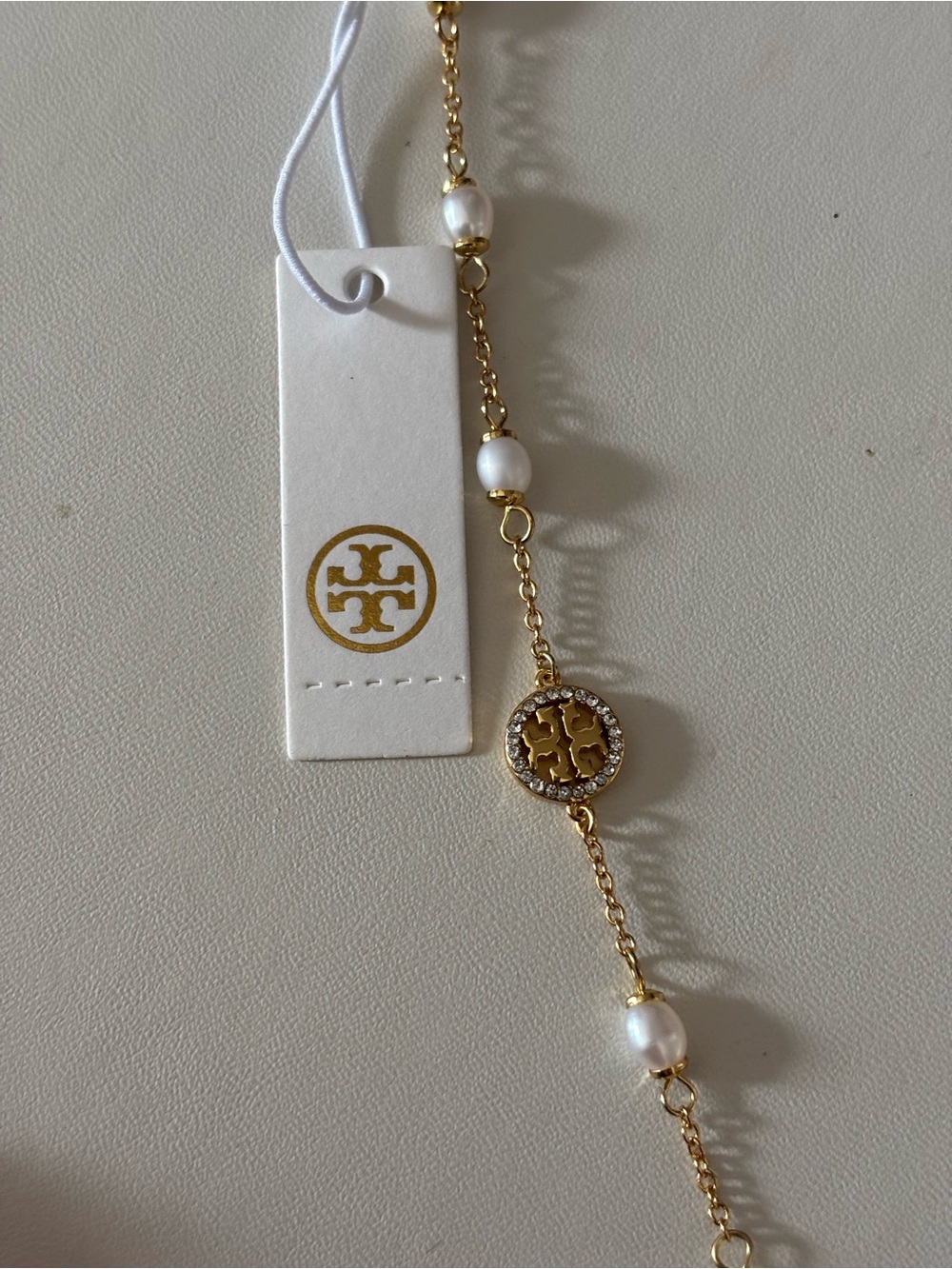 Tory Burch Gold Logo Pearl Station Bracelet with Crystal Accents